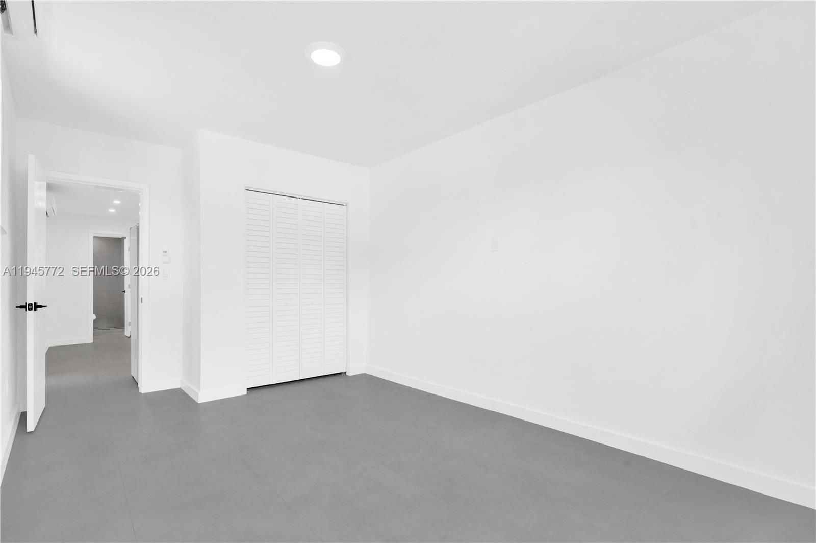 3040 Northwest 93rd Street, Unit A Miami, FL 33147 - Photo 5 of 6 a view of empty room