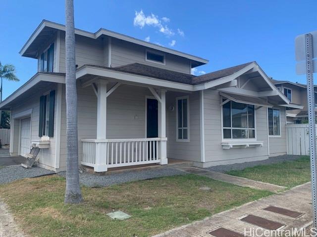 91-211 Kakuhihewa Place, Unit F Kapolei, HI 96707 - Photo 12 of 25 a view of a house with a yard