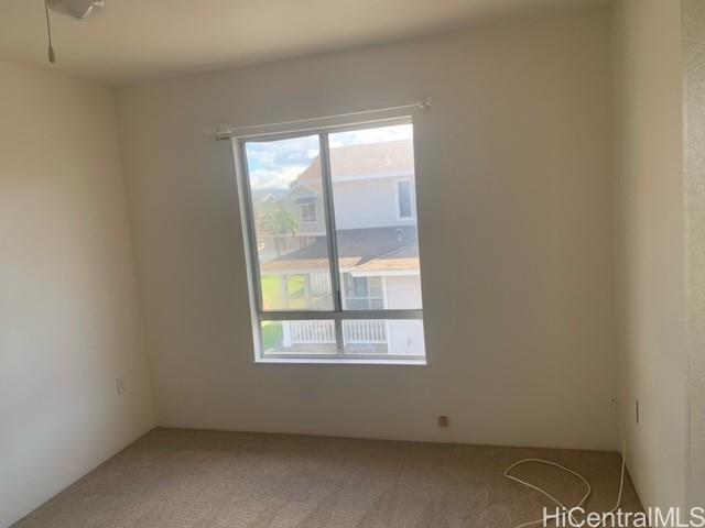 91-211 Kakuhihewa Place, Unit F Kapolei, HI 96707 - Photo 16 of 25 an empty room with a window