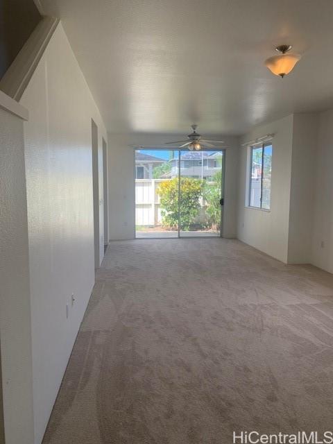 91-211 Kakuhihewa Place, Unit F Kapolei, HI 96707 - Photo 17 of 25 a view of an empty room with a window