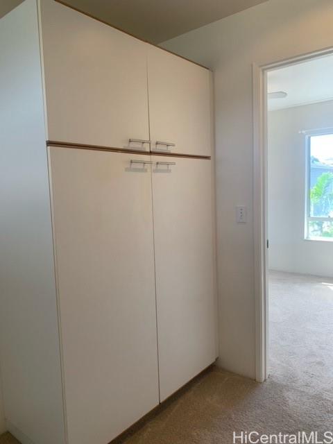 91-211 Kakuhihewa Place, Unit F Kapolei, HI 96707 - Photo 21 of 25 a view of a room with closet