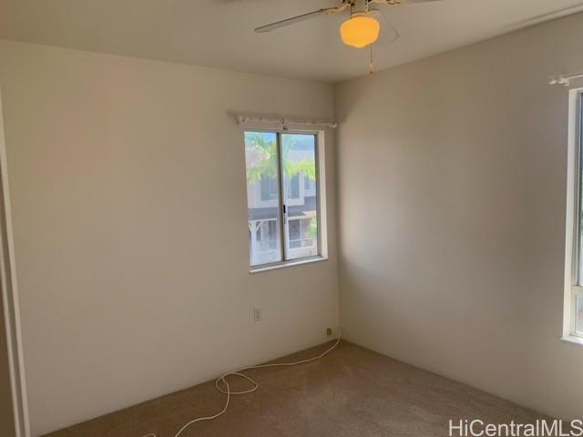91-211 Kakuhihewa Place, Unit F Kapolei, HI 96707 - Photo 6 of 25 an empty room with a window