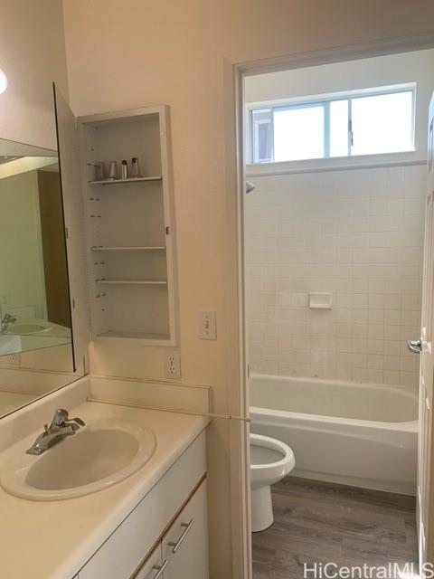 91-211 Kakuhihewa Place, Unit F Kapolei, HI 96707 - Photo 10 of 25 a bathroom with a sink toilet and shower