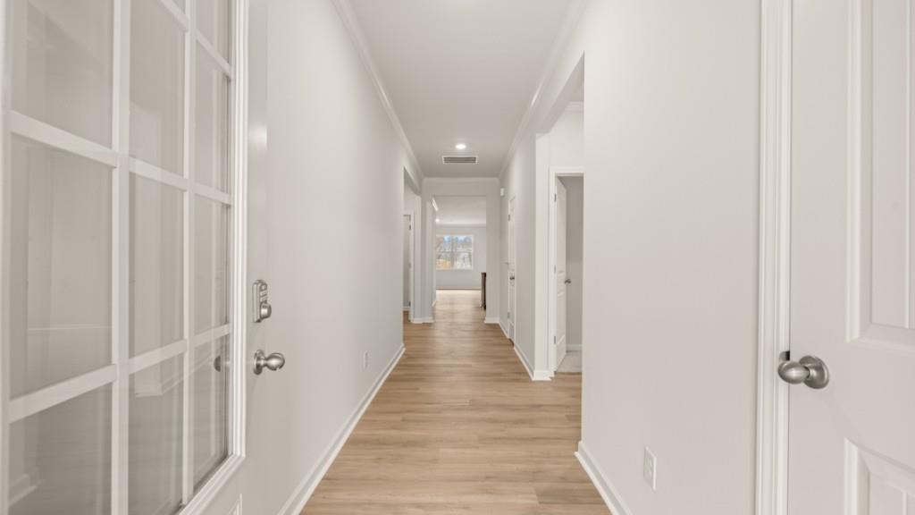 103 Babcock Drive Northeast Rome, GA 30165 - Photo 2 of 33 a view of a hallway with wooden floor and a shower