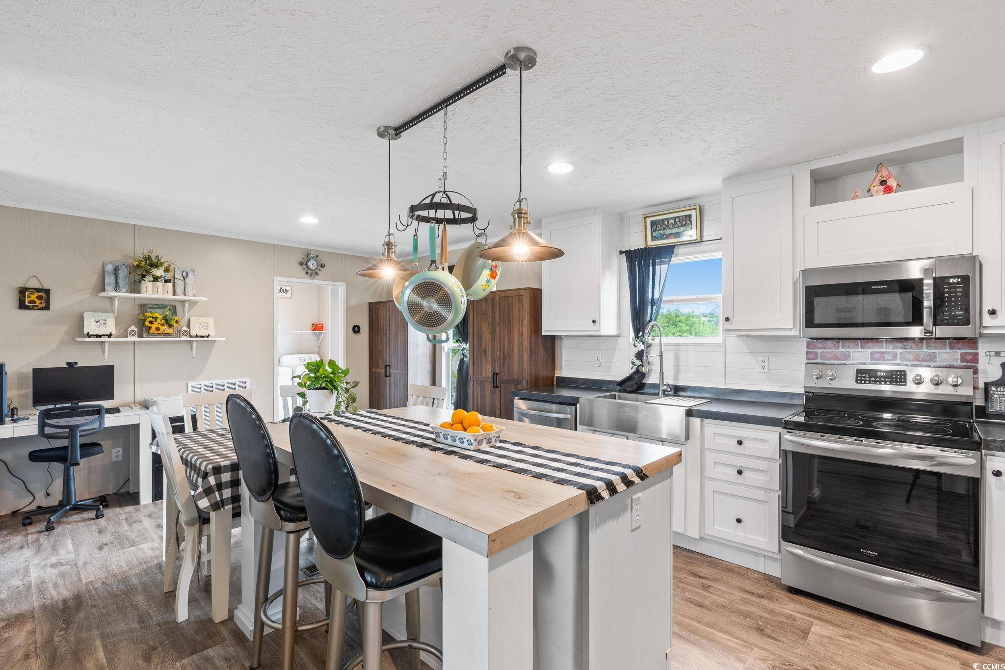 167 Dove Road Loris, SC 29569 - Photo 14 of 40 Kitchen with appliances with stainless steel finis