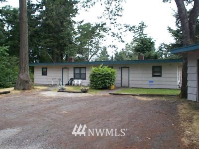 8226 Custer Road Southwest Lakewood, WA 98499 - Photo 1 of 1 a view of a house with backyard and trees