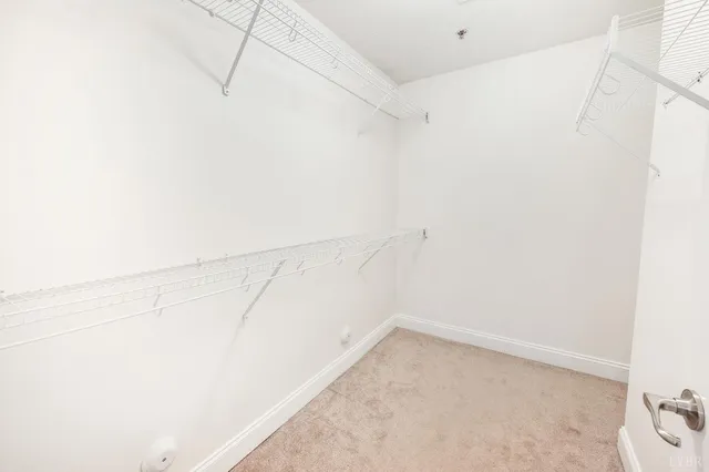 a view of a room with racks on the wall