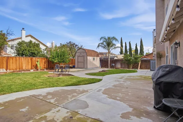 a view of a street with a building in the background