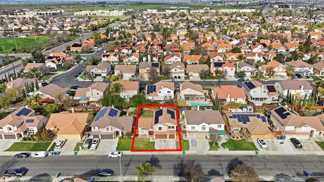 an aerial view of a building with garden space and outdoor space