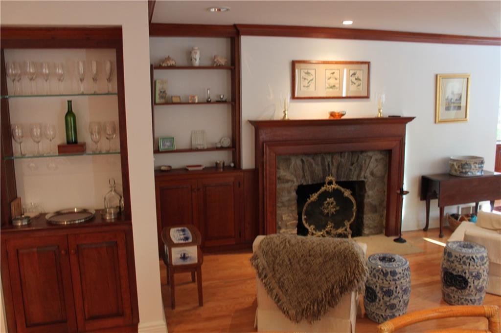 221 Two Mile Run Road Ligonier, PA 15658 - Photo 11 of 44 a bed sitting in a bedroom next to a window and a fireplace