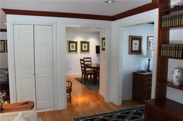 a view of a livingroom with furniture and hardwood floor
