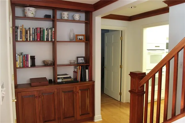 a kitchen with stainless steel appliances granite countertop a refrigerator and a cabinets