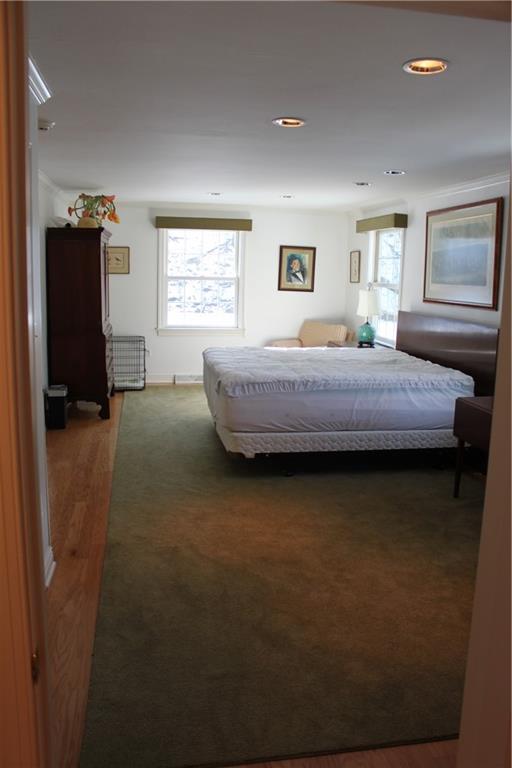 221 Two Mile Run Road Ligonier, PA 15658 - Photo 22 of 44 a bedroom with a bed and wooden floor