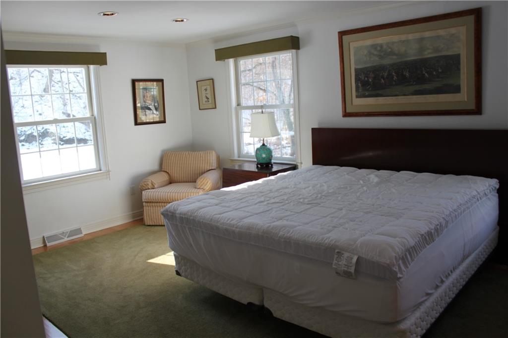 221 Two Mile Run Road Ligonier, PA 15658 - Photo 23 of 44 a bedroom with a bed and window