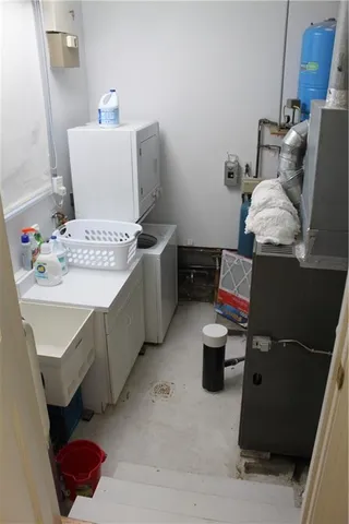 a bathroom with a sink vanity and toilet