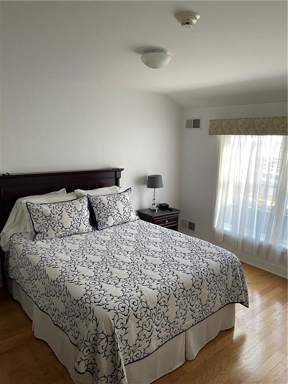 221 Two Mile Run Road Ligonier, PA 15658 - Photo 40 of 44 a large bed sitting in a bedroom next to a window