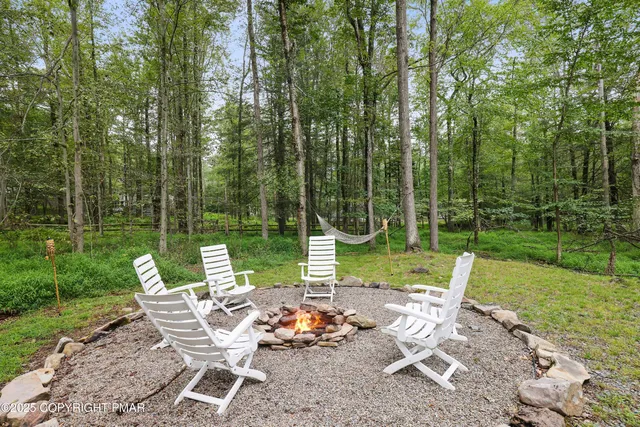 a view of a patio with a yard