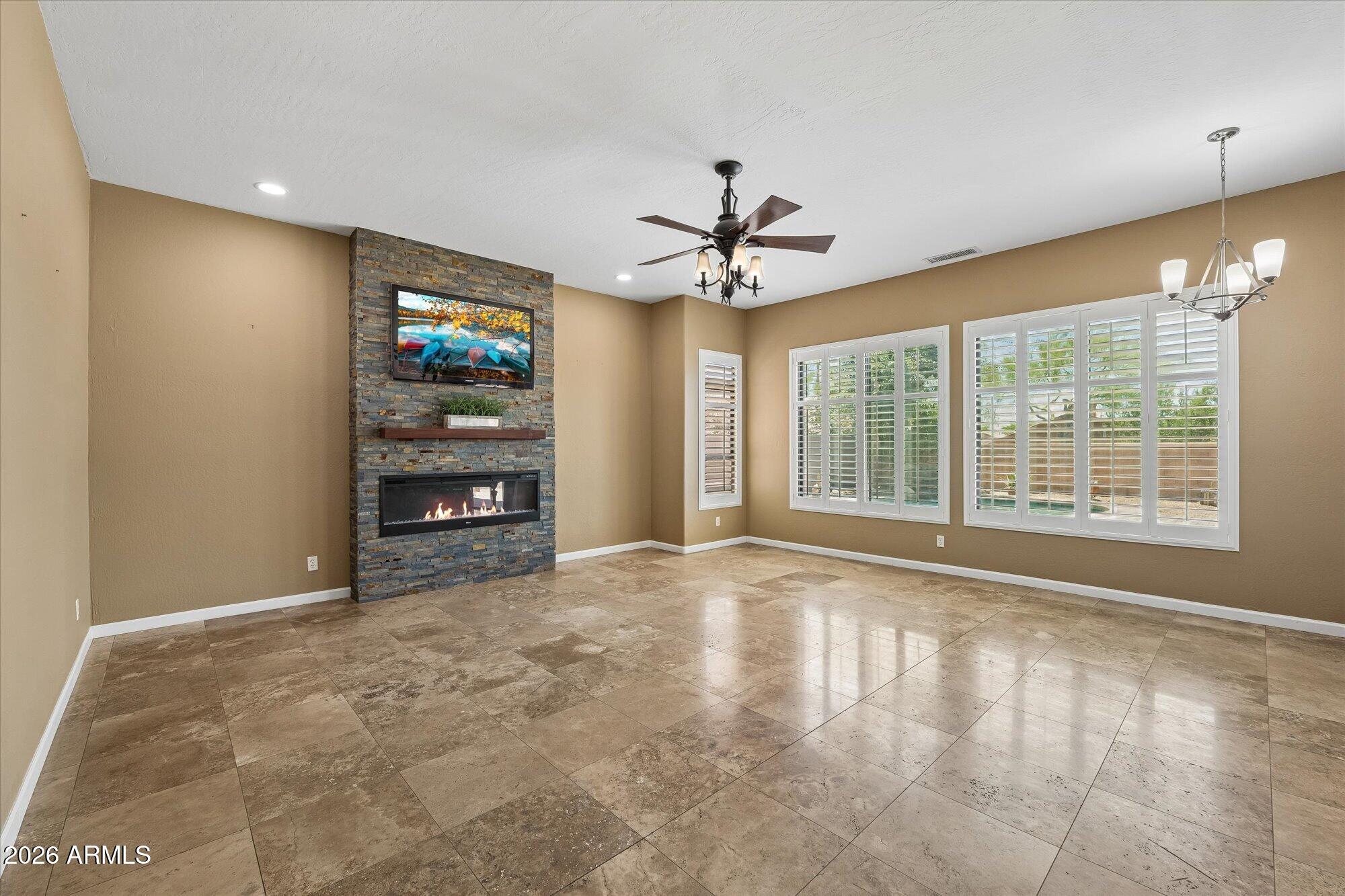 4511 East Swilling Road Phoenix, AZ 85050 - Photo 9 of 36 Family Room w/Cozy Fireplace