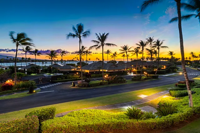 a view of a swimming pool with an outdoor seating