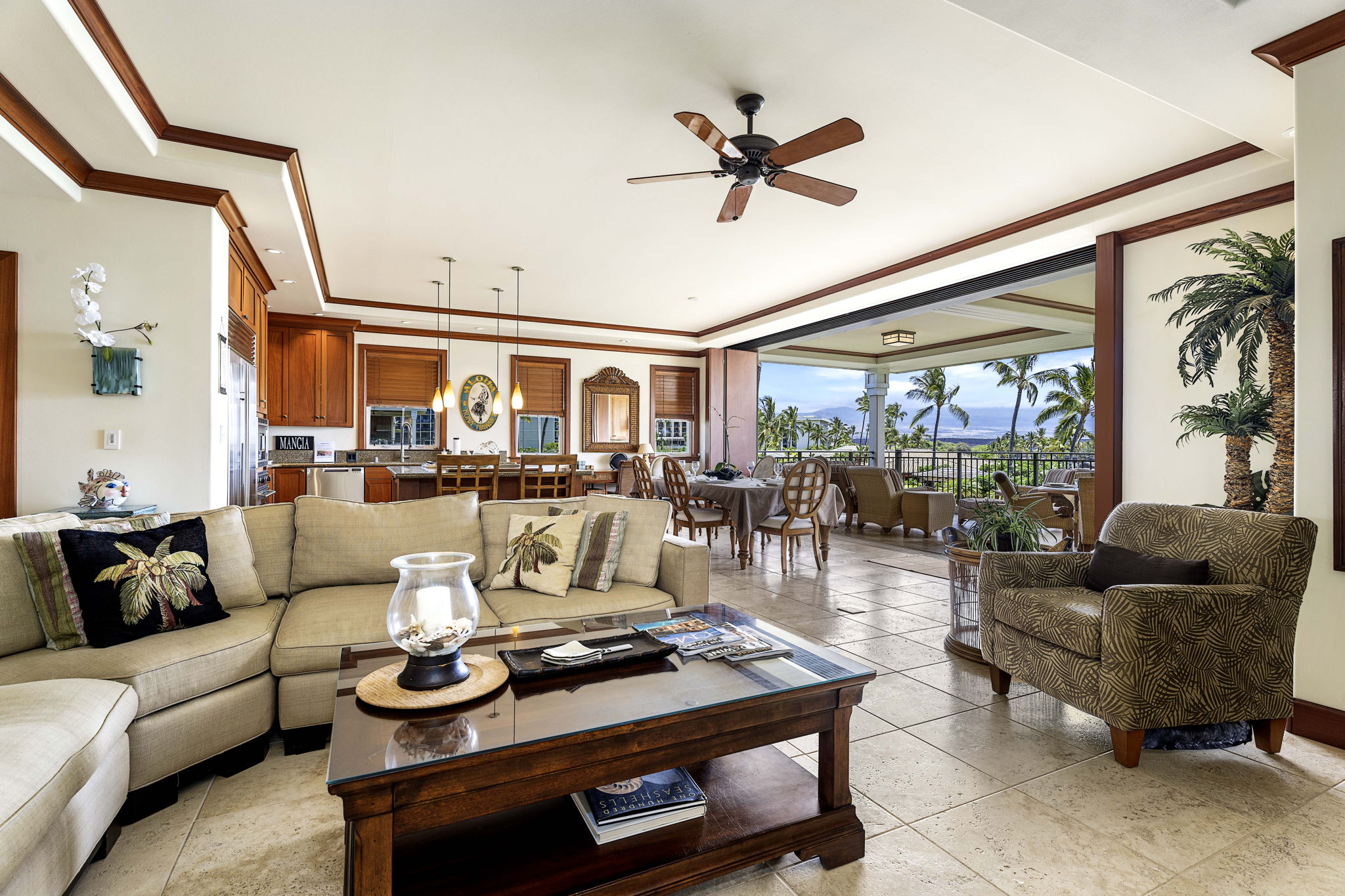 69-1000 Kolea Kai Circle, Unit 10B Waikoloa, HI 96738 - Photo 5 of 27 a living room with furniture and a large window