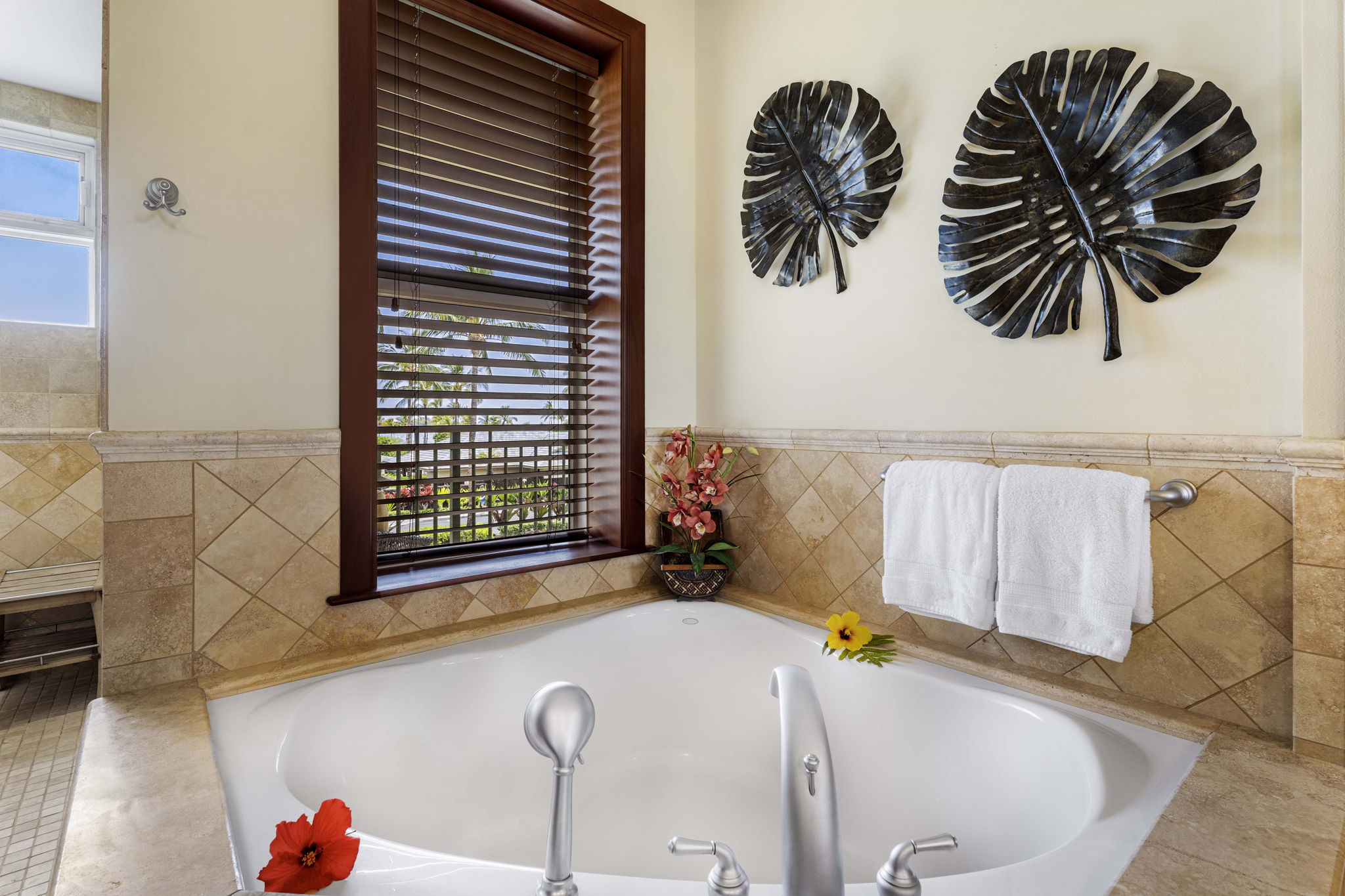 69-1000 Kolea Kai Circle, Unit 10B Waikoloa, HI 96738 - Photo 9 of 27 a view of bathroom with a tub and shower