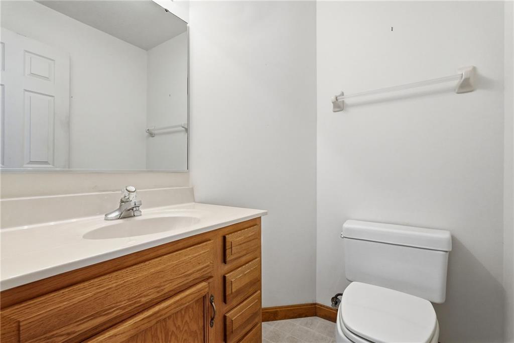 114 Sika Drive Pittsburgh, PA 15239 - Photo 22 of 45 a bathroom with a sink a toilet and a mirror