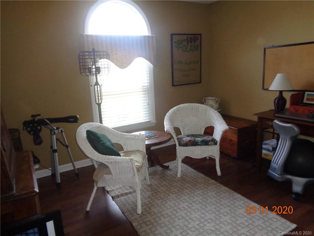 5422 Fish Road Marshville, NC 28103 - Photo 12 of 38 a view of a workspace room with furniture and a window