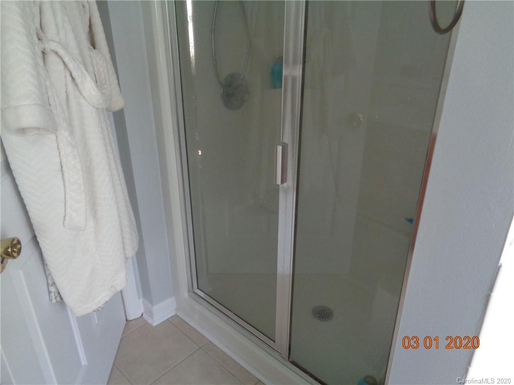 5422 Fish Road Marshville, NC 28103 - Photo 15 of 38 a bathroom with a shower and toilet