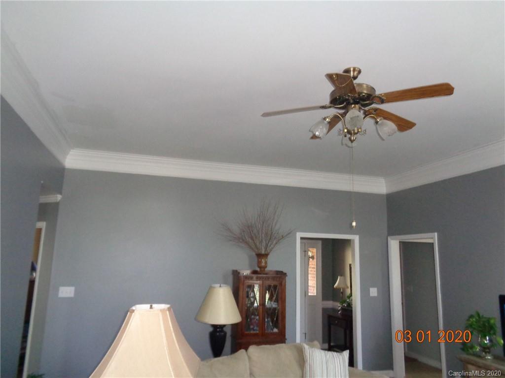 5422 Fish Road Marshville, NC 28103 - Photo 16 of 38 a view of a livingroom with a chandelier