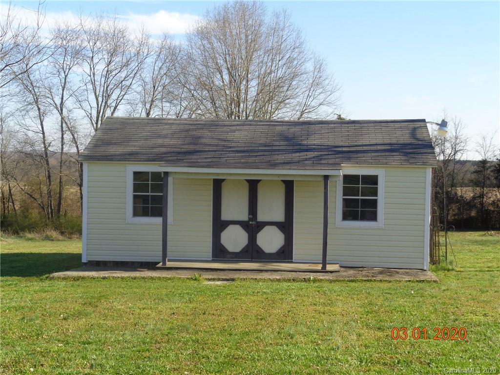 5422 Fish Road Marshville, NC 28103 - Photo 17 of 38 a front view of a house with garden