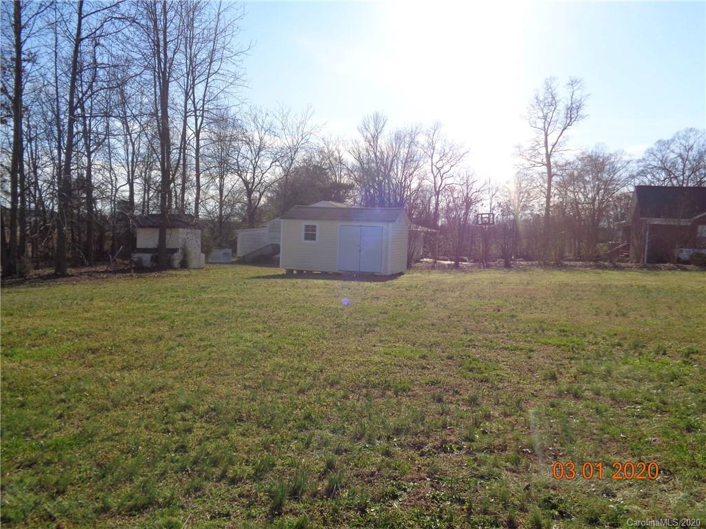 5422 Fish Road Marshville, NC 28103 - Photo 18 of 38 a view of a yard with a house in the background