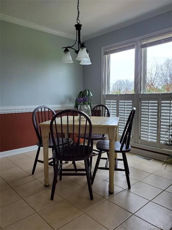 5422 Fish Road Marshville, NC 28103 - Photo 28 of 38 a view of a dining room with furniture window and outside view