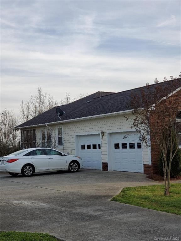 5422 Fish Road Marshville, NC 28103 - Photo 35 of 38 a car parked in front of white house