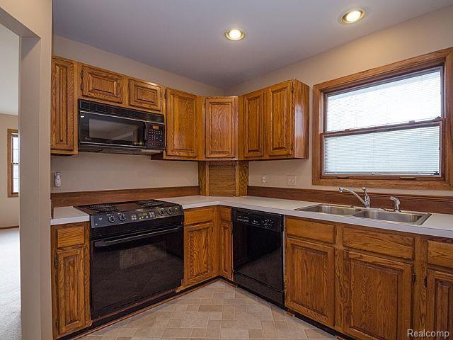 48593 West 9 Mile Road Northville, MI 48167 - Photo 8 of 56 Kitchen, all appliances stay.