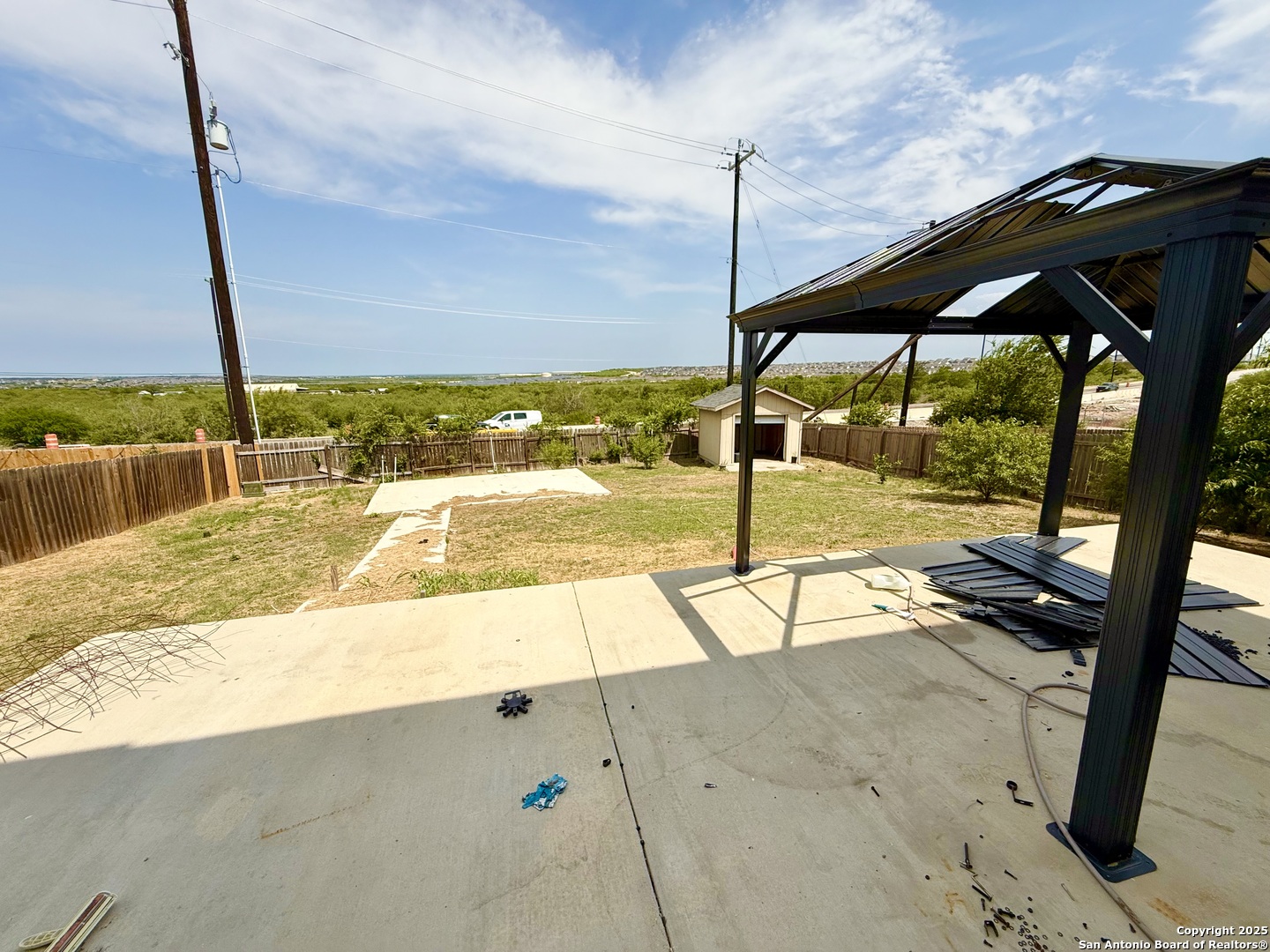 6118 Kensinger Pass Converse, TX 78109 - Photo 24 of 30 a view of swimming pool with a lounge chairs