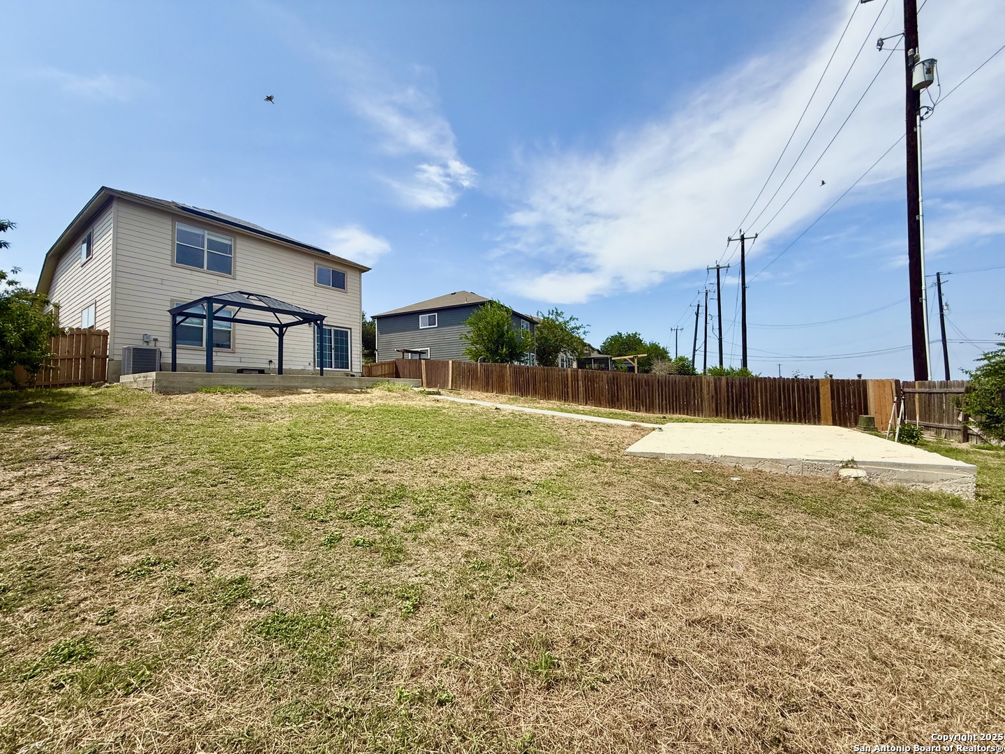 6118 Kensinger Pass Converse, TX 78109 - Photo 28 of 30 a view of a house with a yard