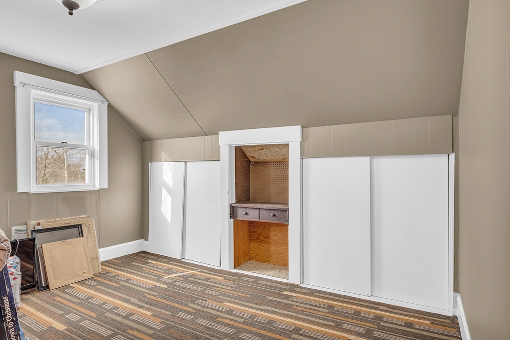 36 Mayfield Road Gardner, MA 01440 - Photo 24 of 35 a view of a bedroom with wooden floor and cabinet