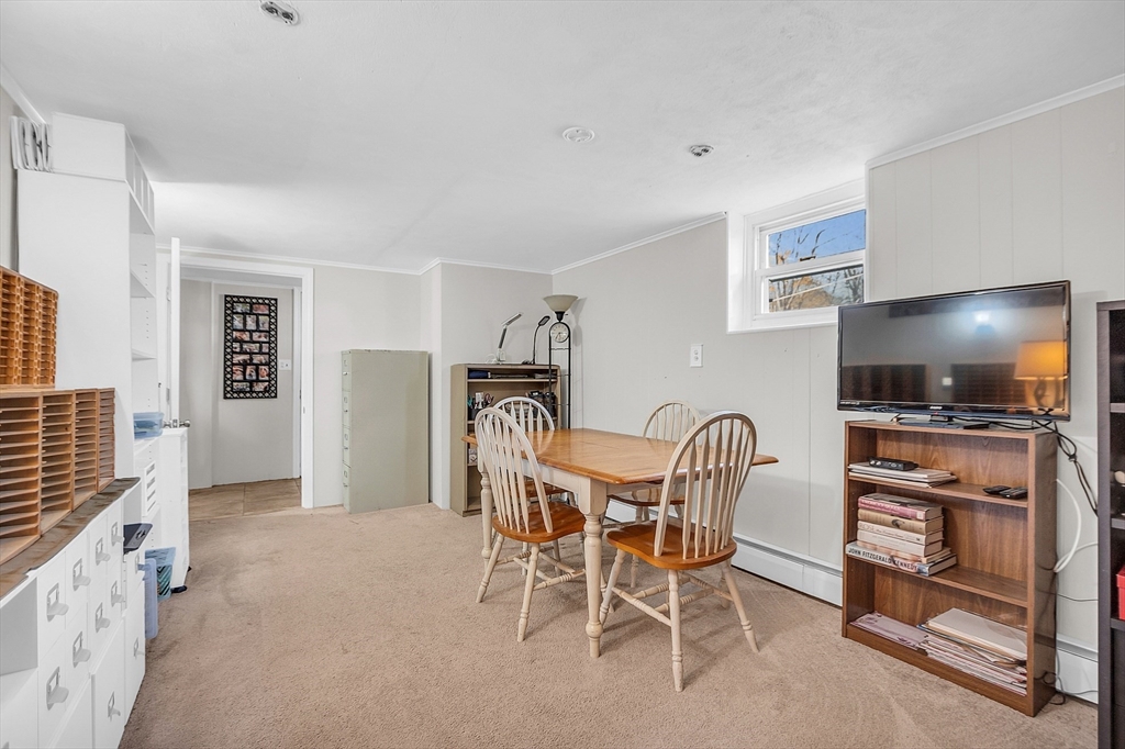 36 Mayfield Road Gardner, MA 01440 - Photo 26 of 35 a view of a livingroom with furniture and a flat screen tv