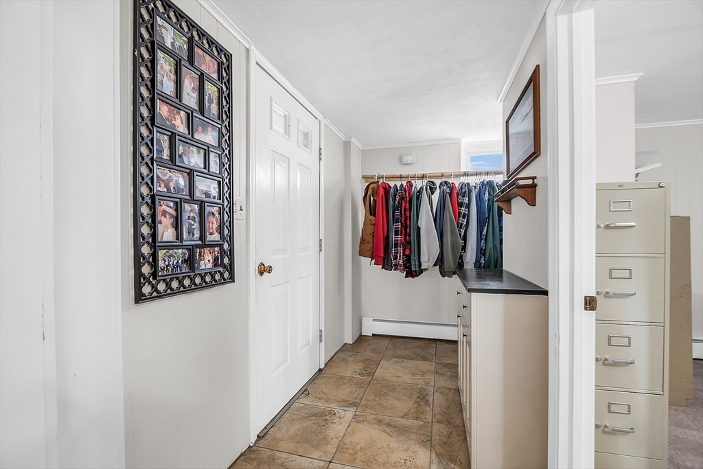 36 Mayfield Road Gardner, MA 01440 - Photo 28 of 35 a view of walk in closet with clothes and shoes