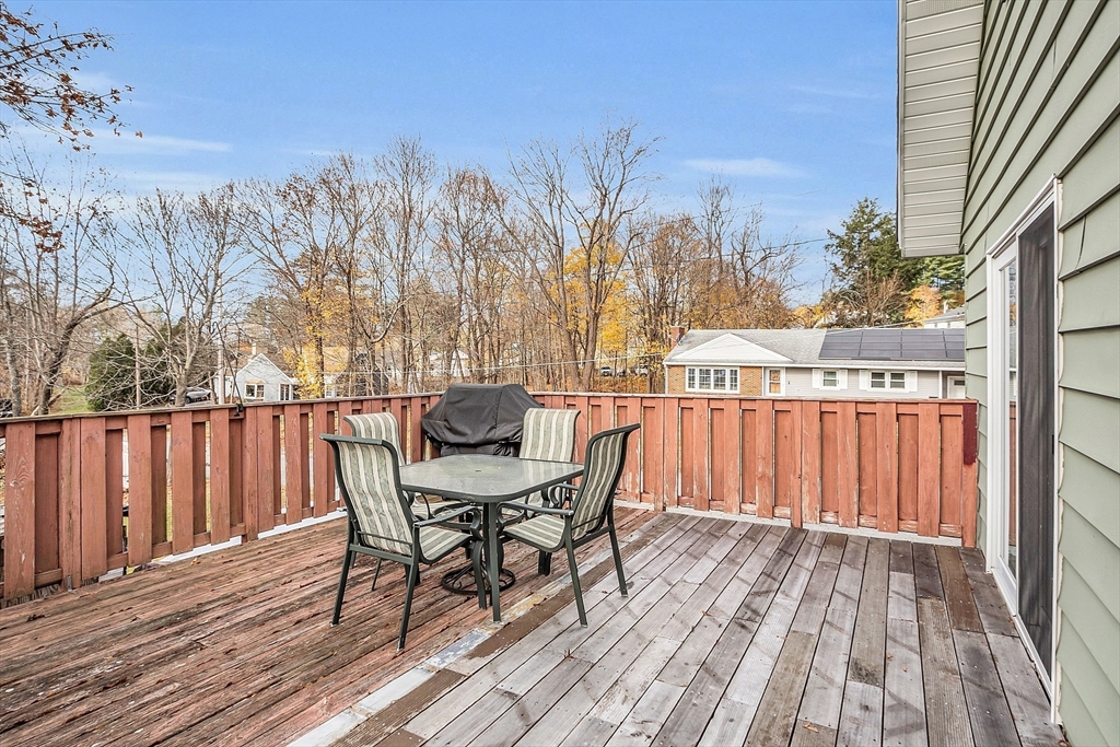 36 Mayfield Road Gardner, MA 01440 - Photo 31 of 35 a view of a balcony with chairs and wooden floor