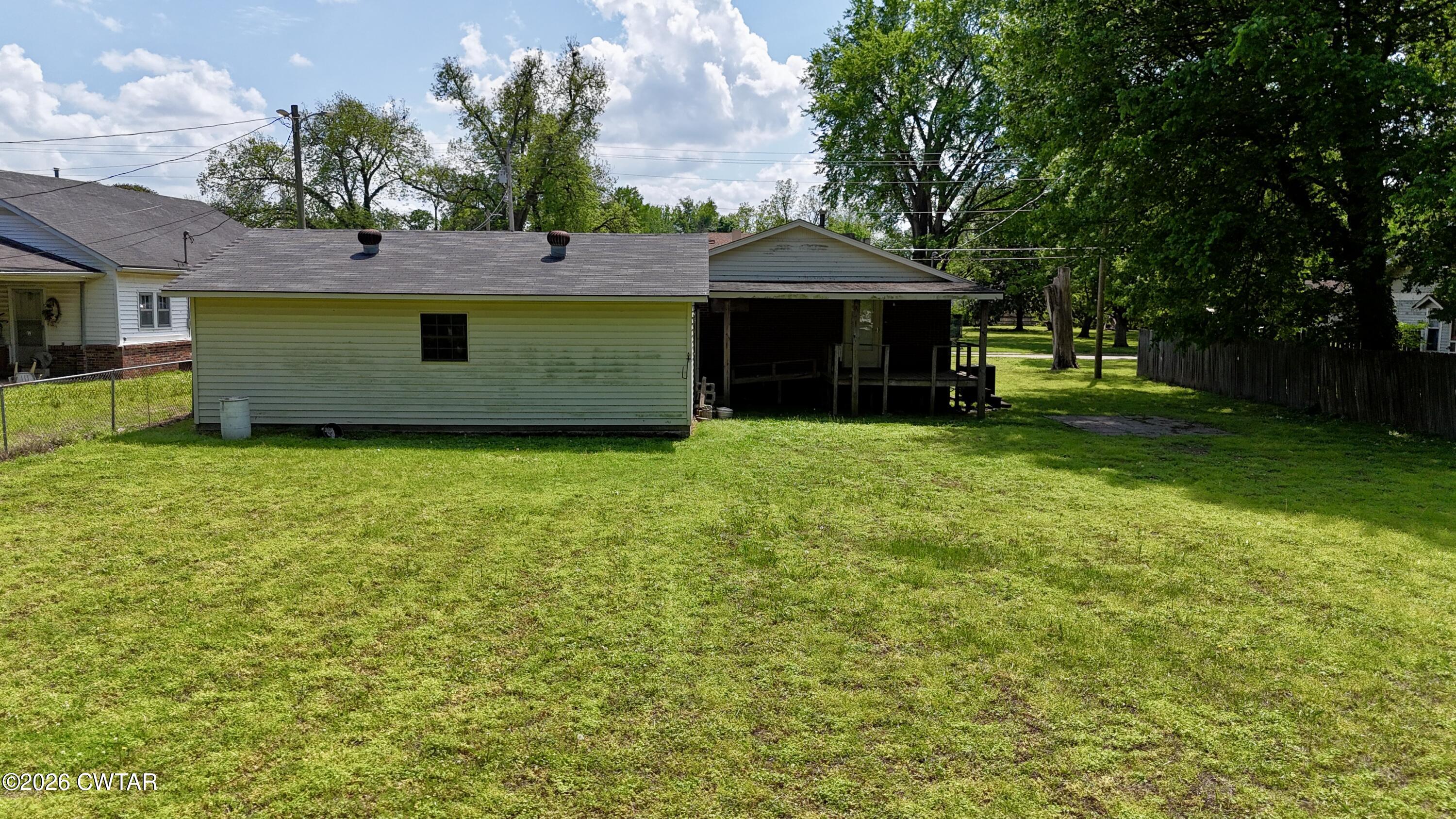 228 Lake Street Ridgely, TN 38080 - Photo 12 of 18 a front view of a house with yard