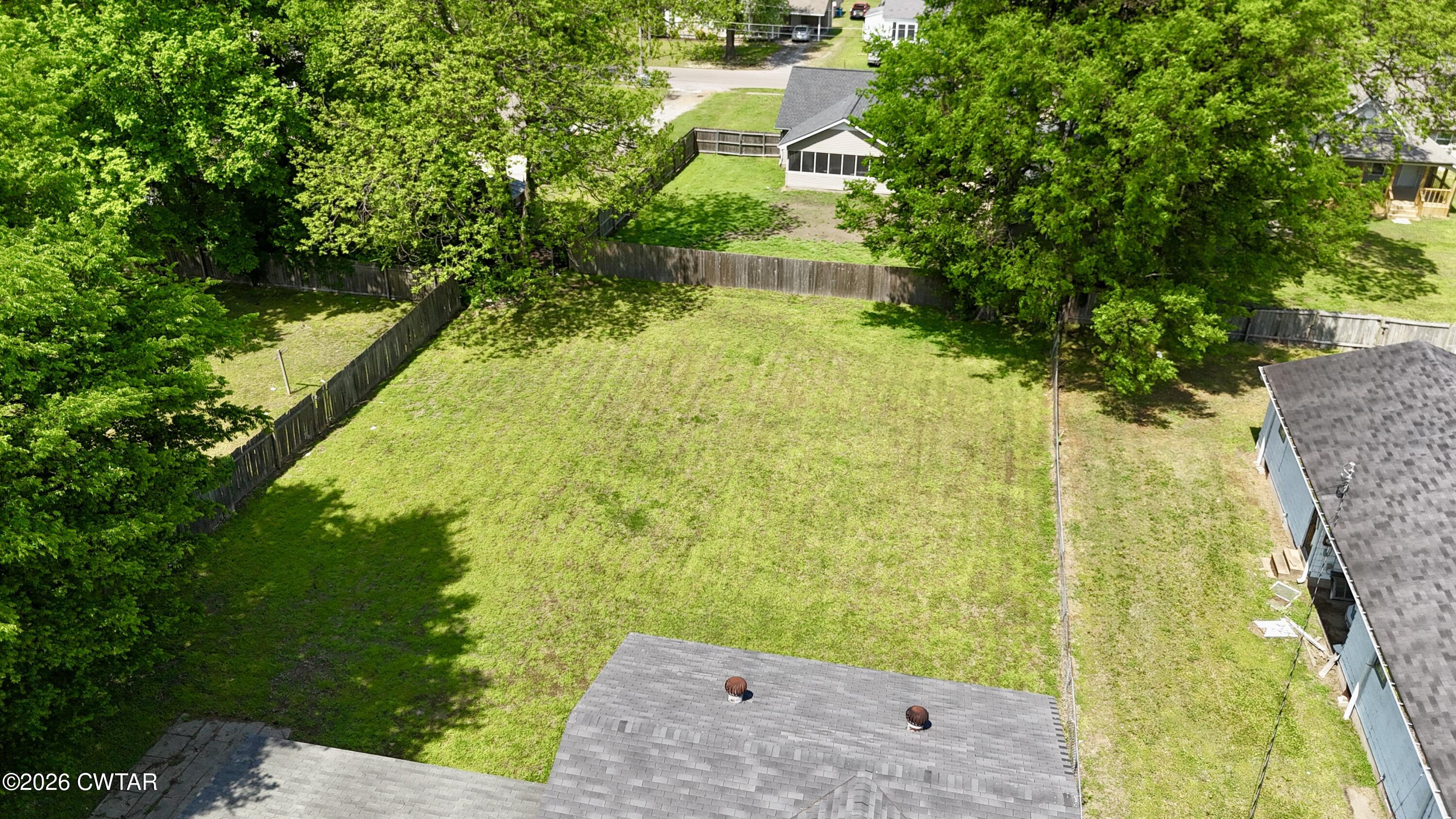 228 Lake Street Ridgely, TN 38080 - Photo 16 of 18 a view of a yard