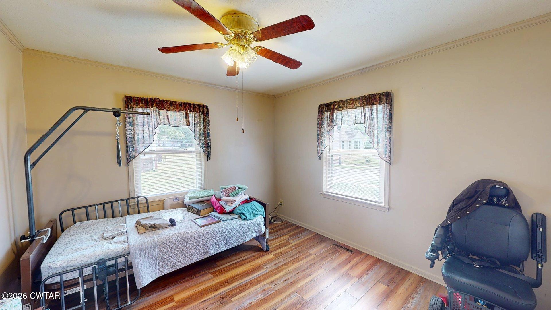 228 Lake Street Ridgely, TN 38080 - Photo 9 of 18 a bedroom with furniture and a window
