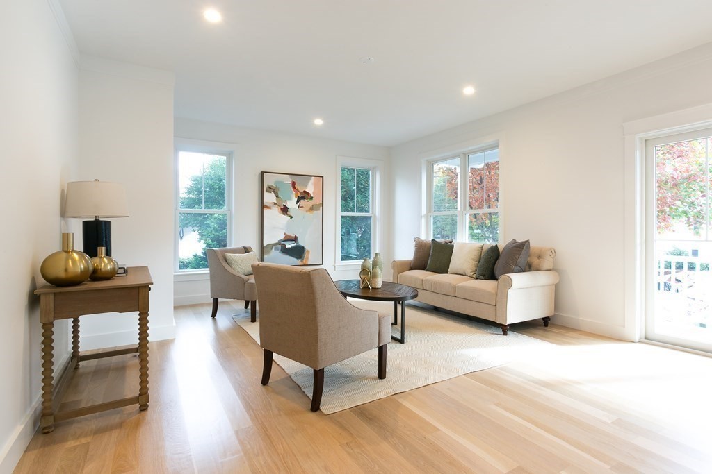 82 Border Road Needham, MA 02492 - Photo 6 of 8 a living room with furniture and a wooden floor