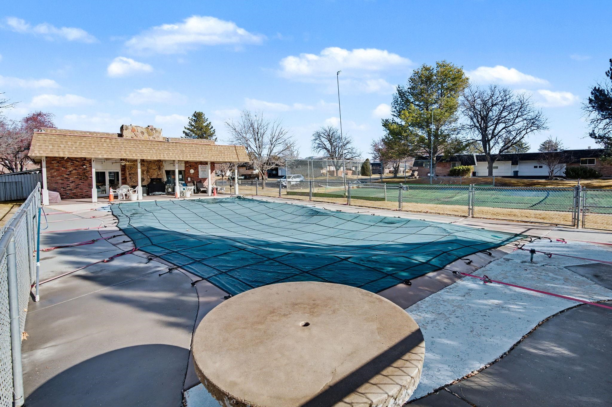 2700 G Road, Unit 12F Grand Junction, CO 81506 - Photo 4 of 24 a view of a swimming pool with a patio