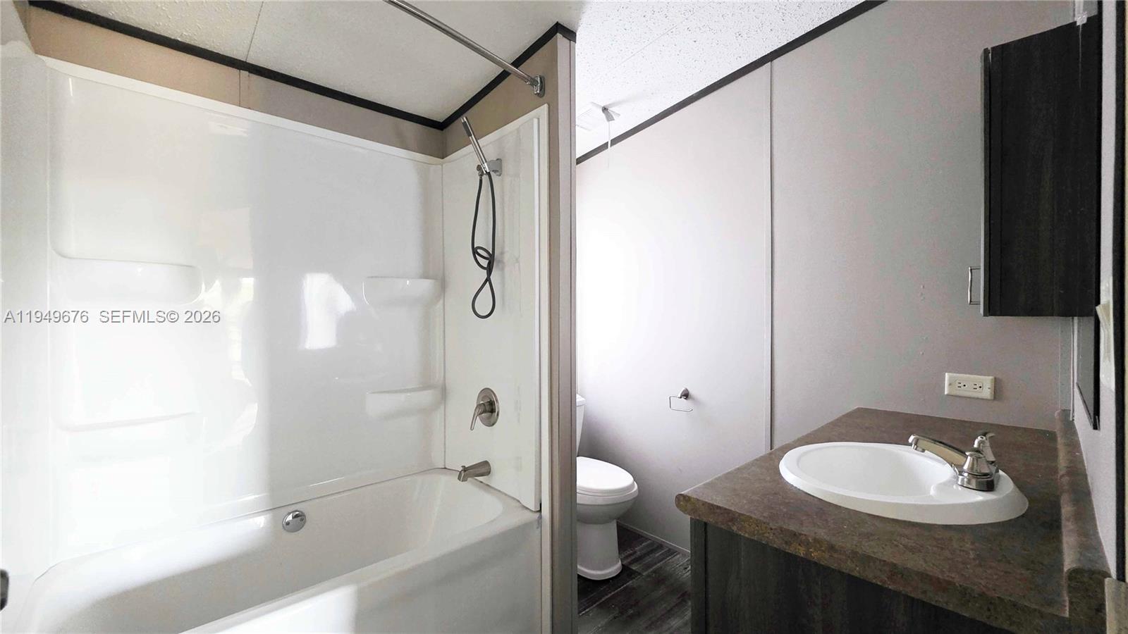 8357 Strasse Boulevard Punta Gorda, FL 33982 - Photo 27 of 37 a bathroom with a sink toilet and shower