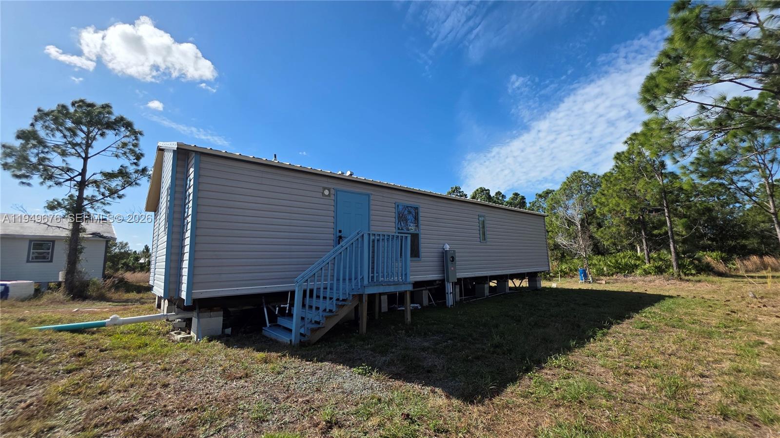 8357 Strasse Boulevard Punta Gorda, FL 33982 - Photo 9 of 37 a view of a house with a patio