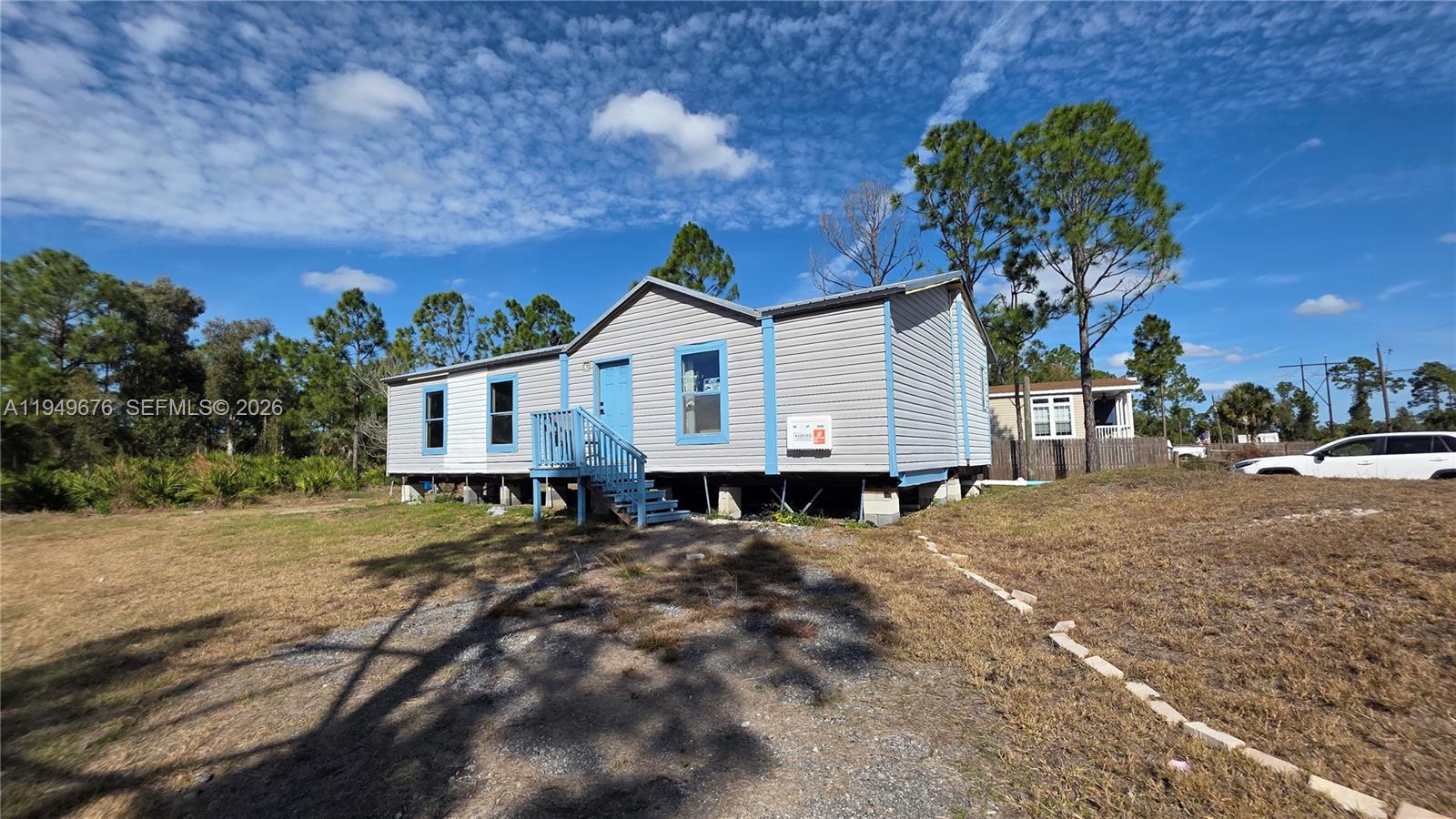 8357 Strasse Boulevard Punta Gorda, FL 33982 - Photo 10 of 37 a view of a house with a yard and tree s