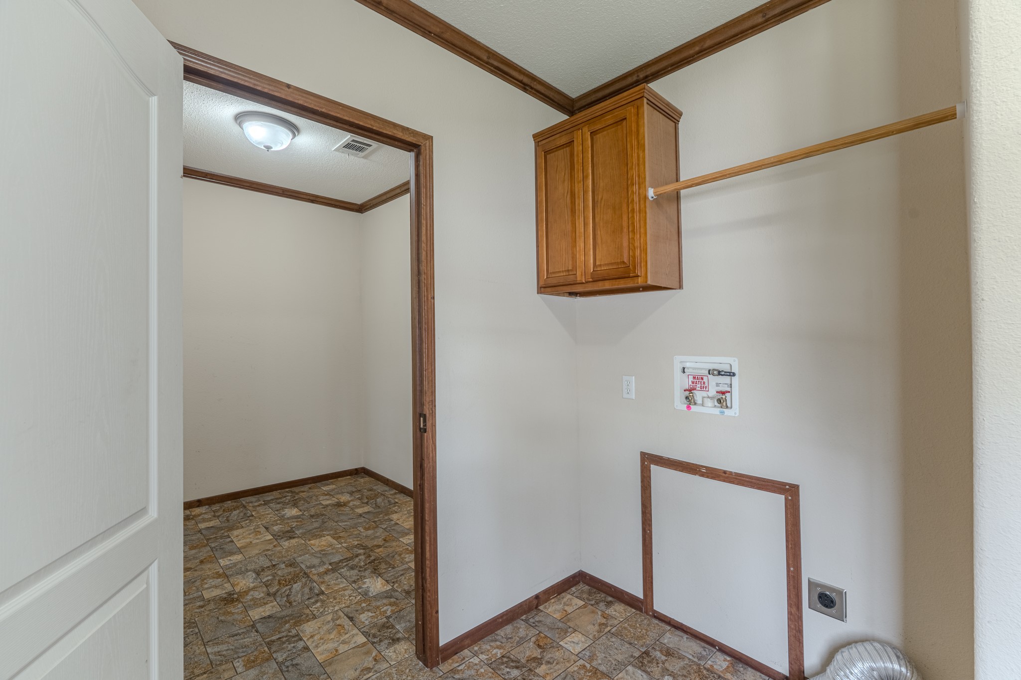 115 Canadian Drive Trinity, TX 75862 - Photo 22 of 42 Laundry room is spacious for a washer and dryer.