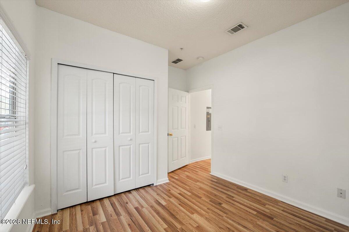 3641 Kirkpatrick Circle, Unit 141 Jacksonville, FL 32210 - Photo 20 of 25 a view of a room with wooden floor